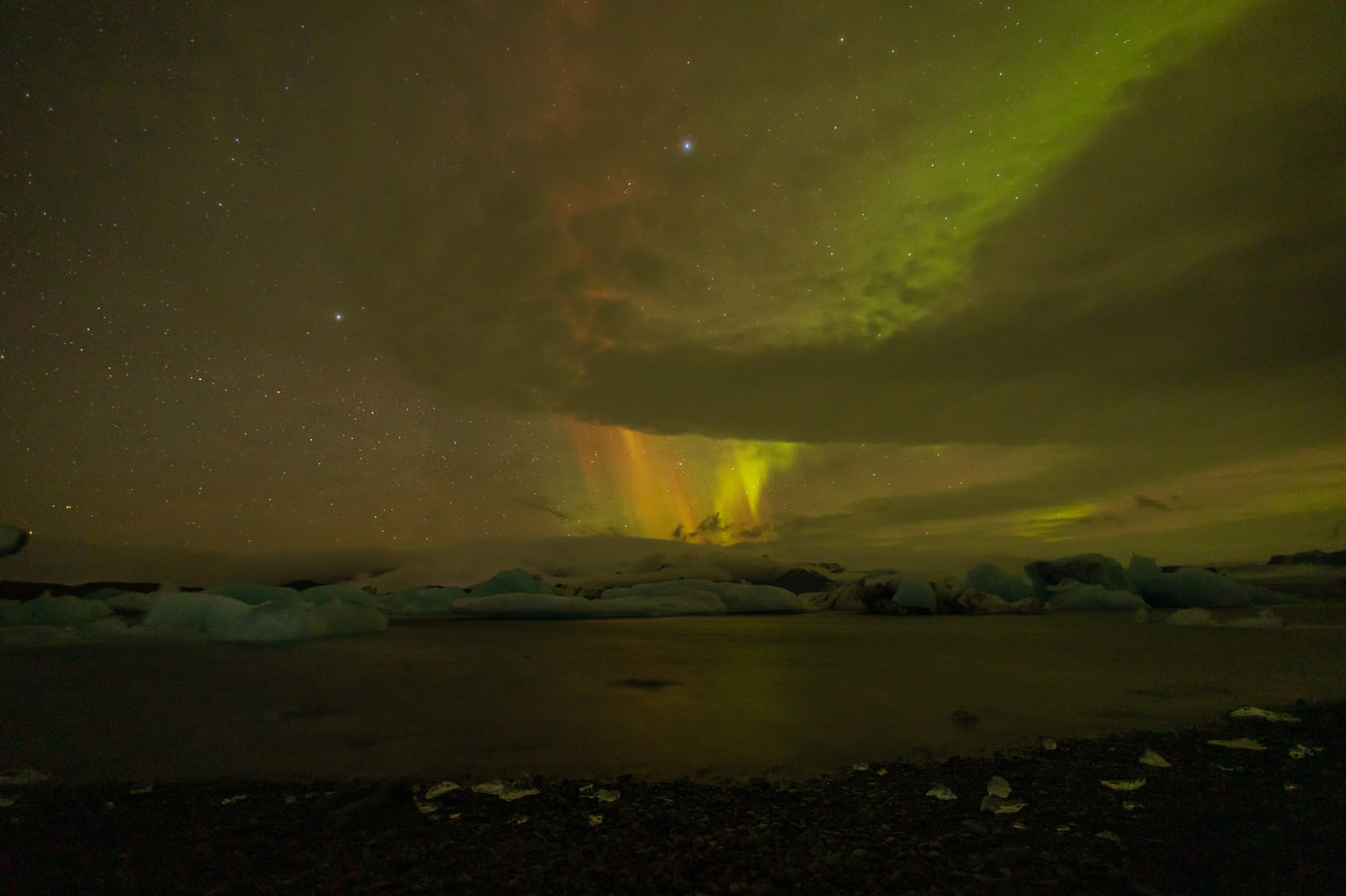 Northern lights over the glacier lagoon, south-east Iceland