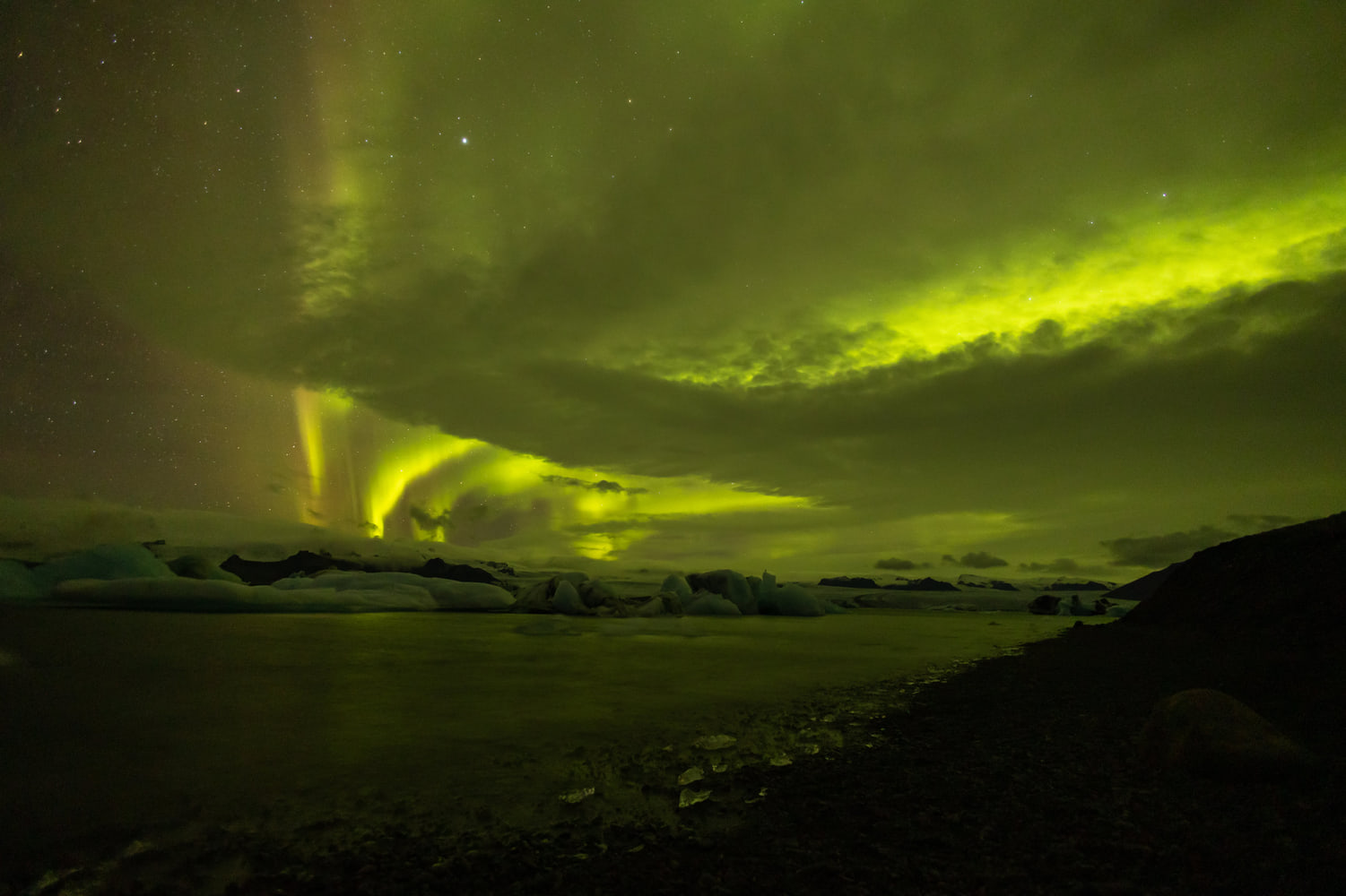 Northern lights over the glacier lagoon, south-east Iceland